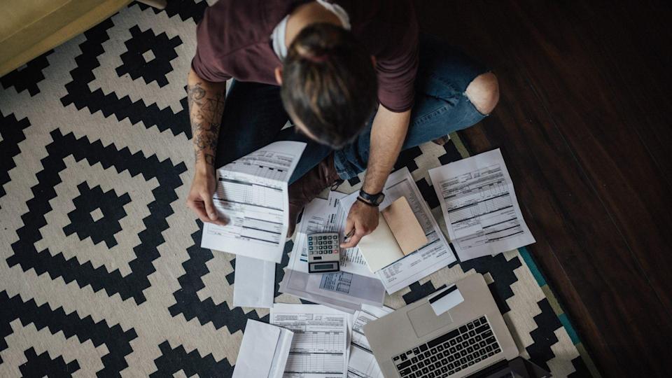 Top view of a student with a pile of arrears.
